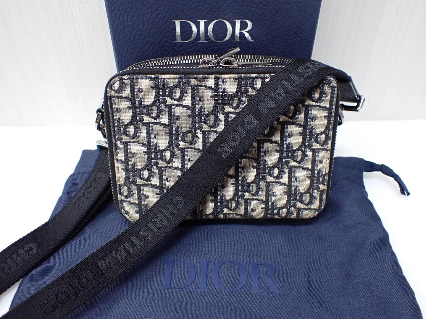 Diorディオールのバッグオブリークトロッターショルダーバッ...